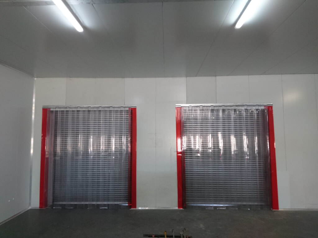 Cold storage facility strip curtains